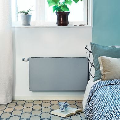 Plan Ventil Compact panelradiator i svalt sovrum.